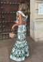 Plunging-V Ruffled Maxi Dress with an Open Back