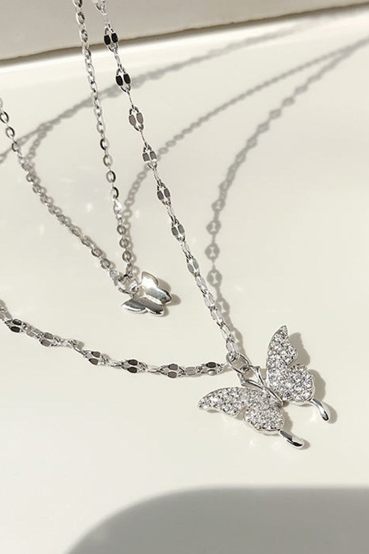 Silver Double-Layer Necklace with Butterfly Details