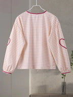 V-Neck Pleated Twist-Detail Blouse