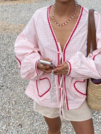 V-Neck Pleated Twist-Detail Blouse