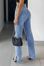High-Rise Flared Distressed Jeans