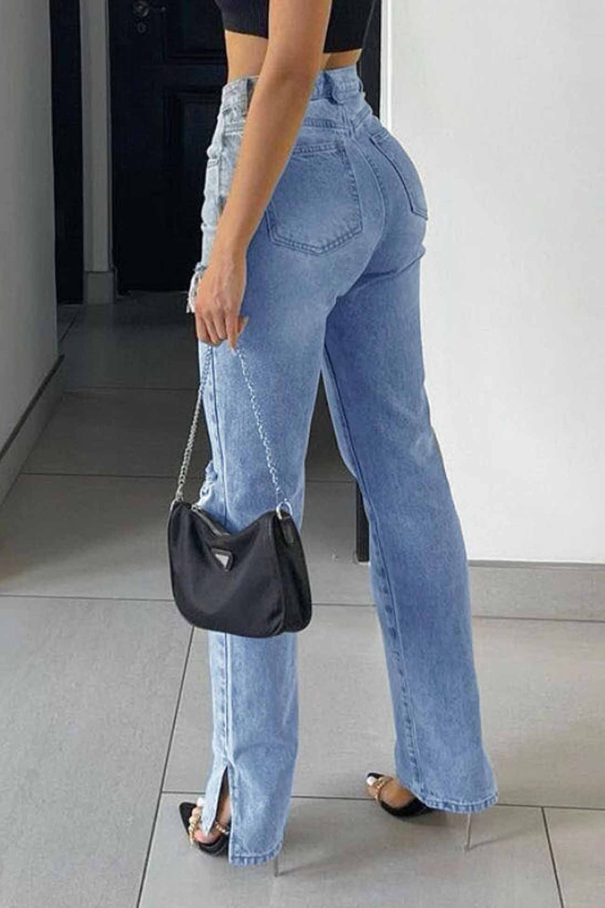 High-Rise Flared Distressed Jeans