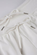 Low-Rise Bodycon Ruffled Shorts with Drawstring Detail