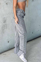 High-Rise Flared Distressed Jeans